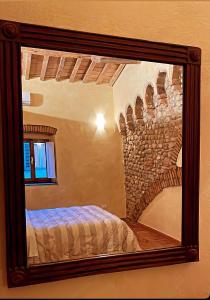 Posteľ alebo postele v izbe v ubytovaní Porta del Chianti Tuscany Apartment