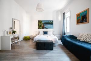 Posteľ alebo postele v izbe v ubytovaní Ca' Garibaldi Rooms