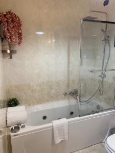 A bathroom at AGM Suite Rome Airport FCO - Attico Parco Leonardo