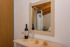 Nápoje v ubytování Hotel Tassia for families & couples - Apartments
