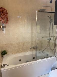 A bathroom at AGM Suite Rome Airport FCO - Attico Parco Leonardo