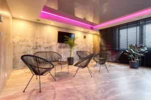 TV a/nebo společenská místnost v ubytování Hotel & Spa Biały Dom