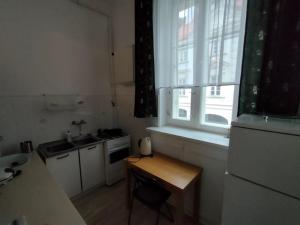 Η κουζίνα ή μικρή κουζίνα στο Przytulny apartament przy Barbakanie