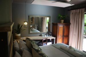 Green Pascua Bed and Breakfast客房内的一张或多张床位