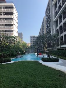 a river in the middle of a city with buildings at Marvest Hua Hin flat B 208 3.fl. Betw.Soi 78-80 in Hua Hin +17 photos