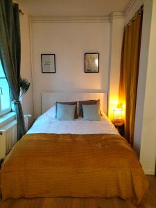 Postel nebo postele na pokoji v ubytování Le Barcelone + 4 fotografie