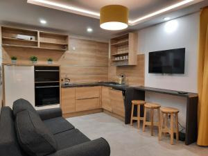 Kuchyň nebo kuchyňský kout v ubytování Apartamenty Lubin -Amaretto-