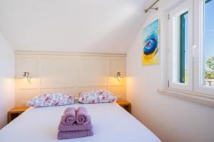 Postel nebo postele na pokoji v ubytování Olive Park House Brač + 37 fotografií