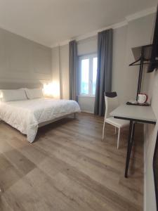 Postel nebo postele na pokoji v ubytování Residenza Montebello