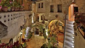 an overhead view of a building with potted plants at Kookaburra Pension in Göreme