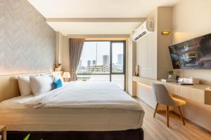 Postel nebo postele na pokoji v ubytování 56 Hotel