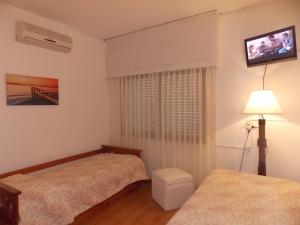 Cama ou camas em um quarto em Bonne Etoile