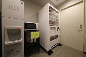 TV i/ili multimedijalni sistem u objektu Smile Hotel Kanazawa Nishiguchi Ekimae