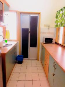 Kuchyň nebo kuchyňský kout v ubytování 101 Sky Mirror Homestay