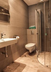 Kylpyhuone majoituspaikassa Pension Villa Louise