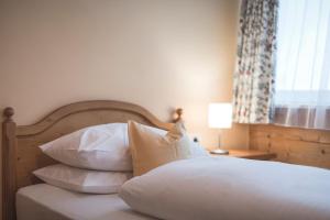 Postel nebo postele na pokoji v ubytování Hotel Bad Salomonsbrunn