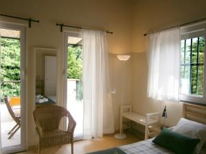 A bed or beds in a room at Il Bosco di Campo Marzano green & sky