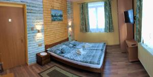 Ένα ή περισσότερα κρεβάτια σε δωμάτιο στο Vila Limba