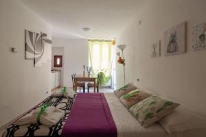 Postel nebo postele na pokoji v ubytování Ciao Bella COLORS