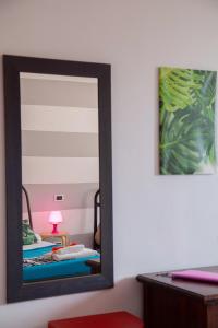 Postel nebo postele na pokoji v ubytování Ciao Bella COLORS