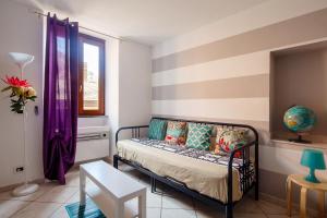 Postel nebo postele na pokoji v ubytování Ciao Bella COLORS