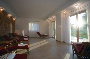 Posezení v ubytování Hotel Gasthof Moosleitner