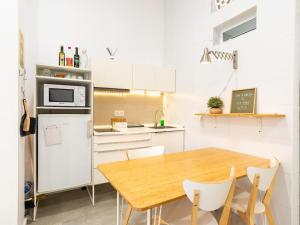 Kuchyňa alebo kuchynka v ubytovaní LU&CIA LOFT City Center