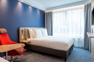Postel nebo postele na pokoji v ubytování Holiday Inn Express - Almere by IHG + 37 fotografií