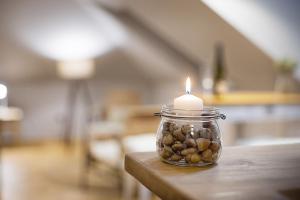 Posteľ alebo postele v izbe v ubytovaní Apartmány v domečku