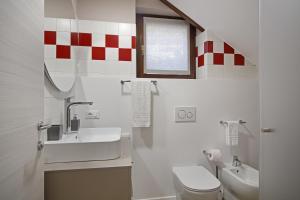 Koupelna v ubytování Apartment Ninetta Belluno Dolomiti