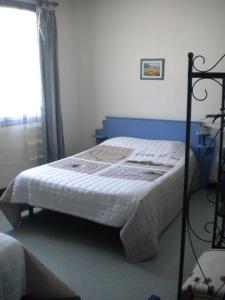 Cama o camas de una habitación en L 'Acropole