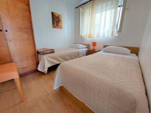 Fotografie z fotogalerie ubytování Sea front holiday home Boby v Primoštenu