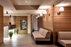 Area soggiorno di Smy Carlos V Wellness & Spa Alghero