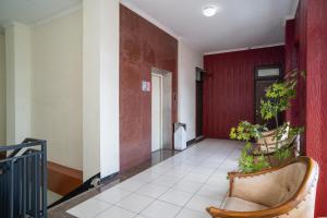 Istumisnurk majutusasutuses Urbanview Hotel de Kopen Malang by RedDoorz