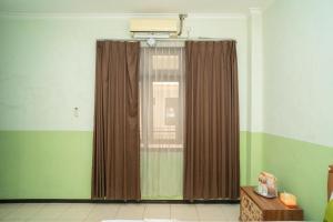 Foto sihtkohas Malang asuva majutusasutuse Urbanview Hotel de Kopen Malang by RedDoorz galeriist