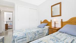 Postel nebo postele na pokoji v ubytování Can 1 - Calella de Palafrugell
