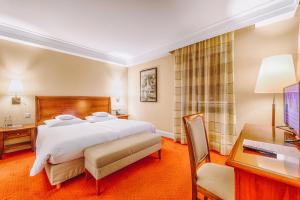 Postel nebo postele na pokoji v ubytování Hotel Moosburger Hof