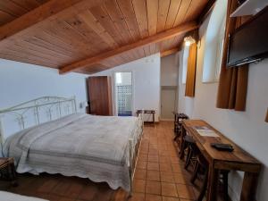 Tempat tidur dalam kamar di Torretta ai Sassi