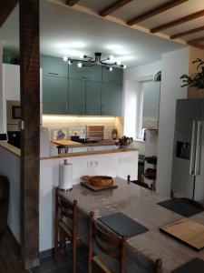 Η κουζίνα ή μικρή κουζίνα στο Le Jardin B&B