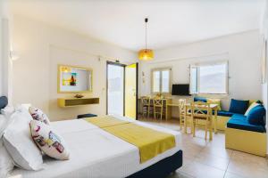 A bed or beds in a room at Aelia Apartments & Suites Még 37 kép