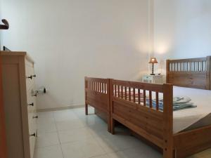 A bed or beds in a room at Finestrelle Pied à terre a Otranto
