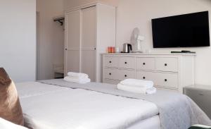 Posteľ alebo postele v izbe v ubytovaní Avila Park & SPA