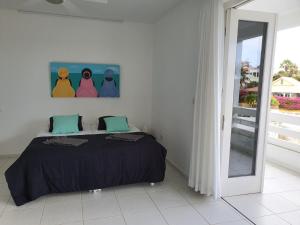 Postelja oz. postelje v sobi nastanitve B1 APARTMENT with Balcony at JAN THIEL Curacao