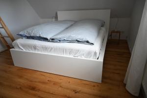Cama o camas de una habitación en Hyggelig in Holstein