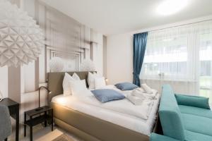 Tempat tidur dalam kamar di BUDAPEST DOWNTOWN RESIDENCES LEO - AC, ELEVATOR, TERRACE