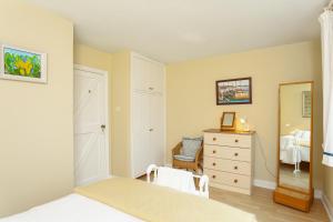 A bed or beds in a room at Tidewater Apartment Baltimore by Trident Holiday Homes