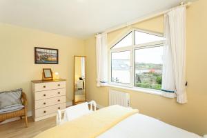 Krevet ili kreveti u jedinici u okviru objekta Tidewater Apartment Baltimore by Trident Holiday Homes