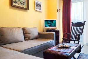 Telewizja i/lub zestaw kina domowego w obiekcie Trinity Apartment