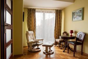 Część wypoczynkowa w obiekcie Trinity Apartment