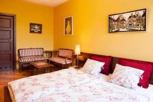 Łóżko lub łóżka w pokoju w obiekcie Trinity Apartment
